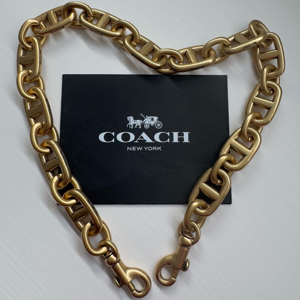 Brand new Coach shoulder strap brass